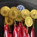 MEDAL_ZŁOTY_W_ZE_WSTĄŻKĄ (3)_mobile.webp